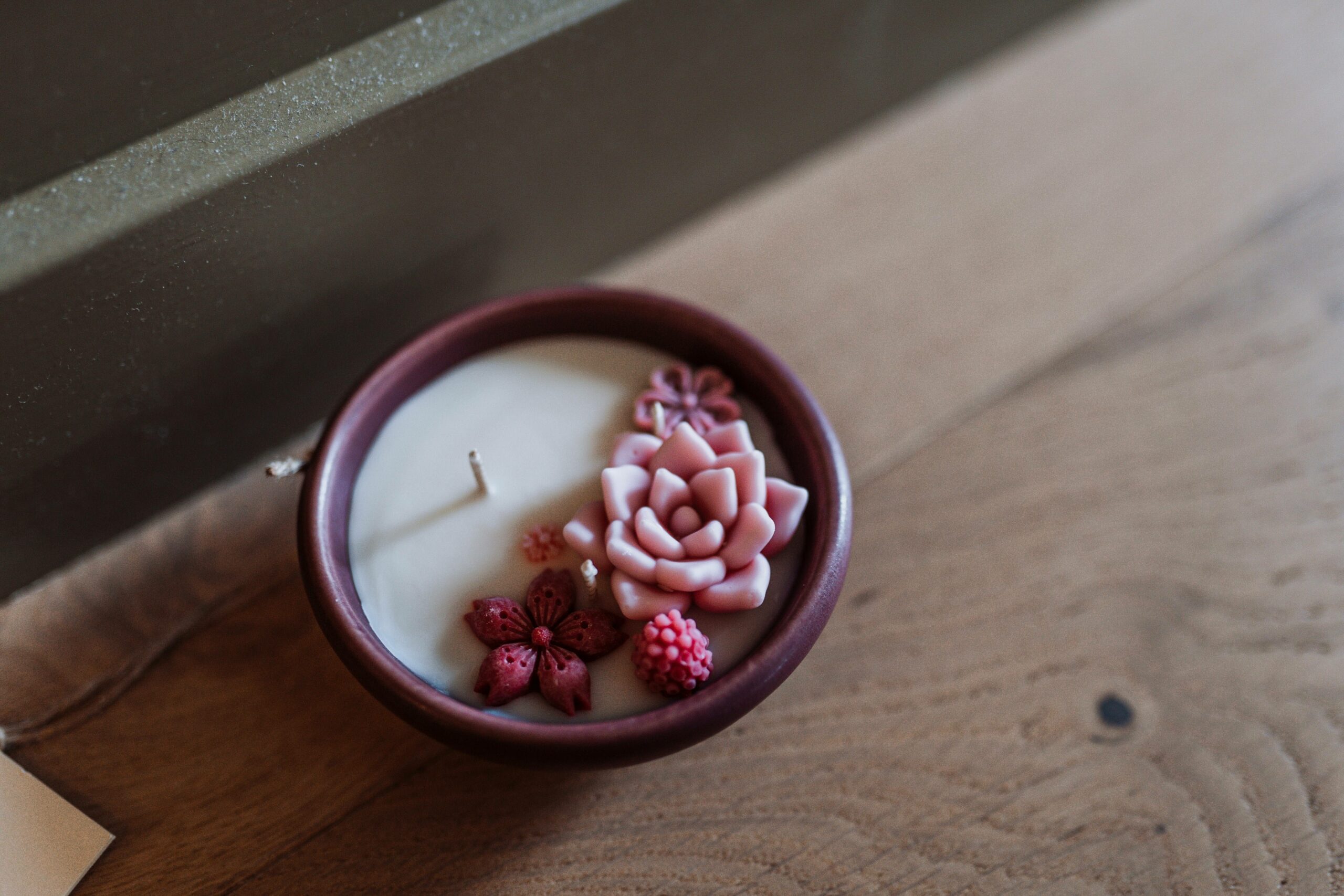 Bougie artisanale Osmose en céramique portugaise, création haut de gamme destinée aux boutiques à Lorient